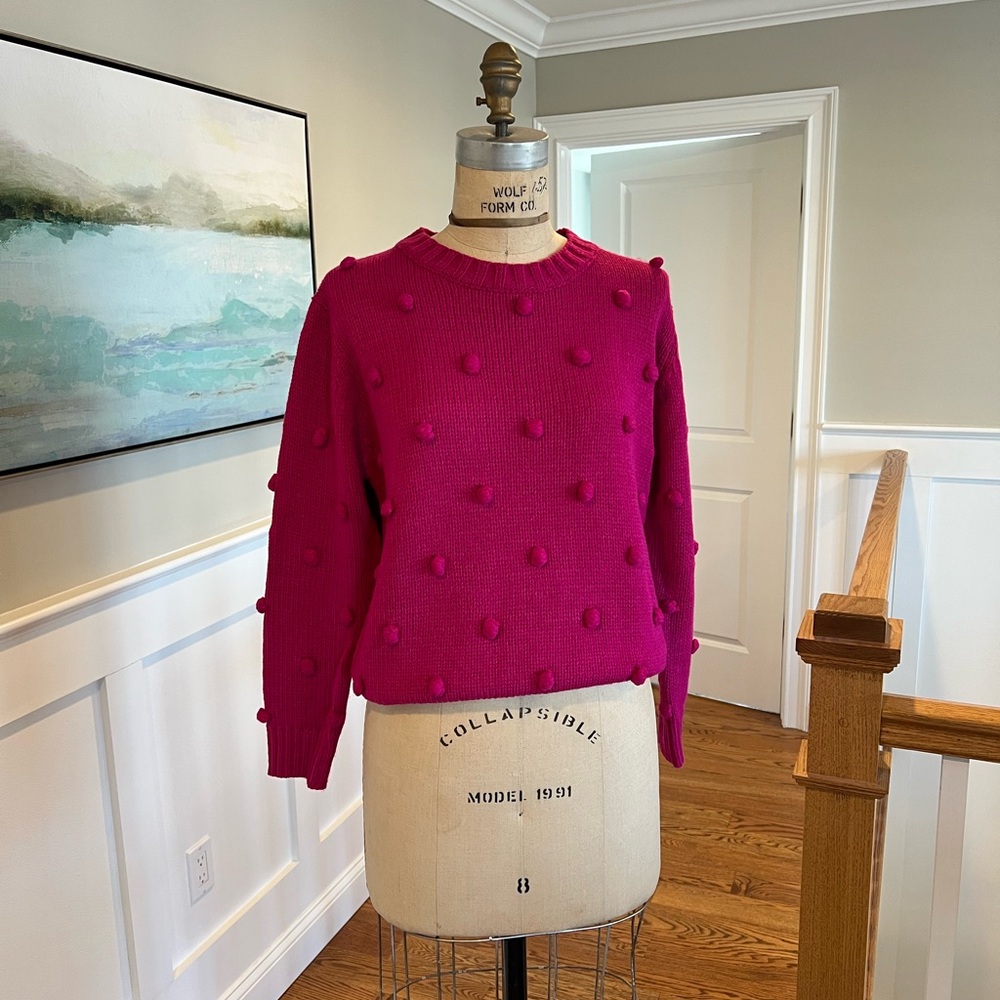 Pink Lily, Pom pom sweater in color Pink/Magenta, size small.